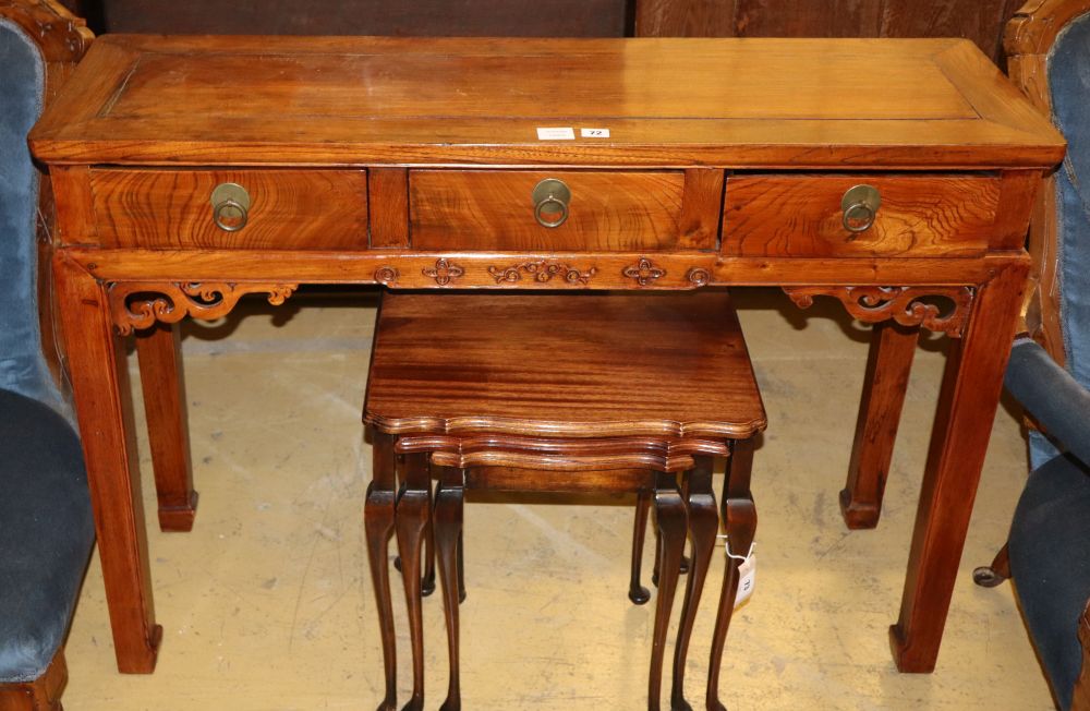 A Chinese hardwood three drawer side table, W.116cm, D.36cm, H.82cm